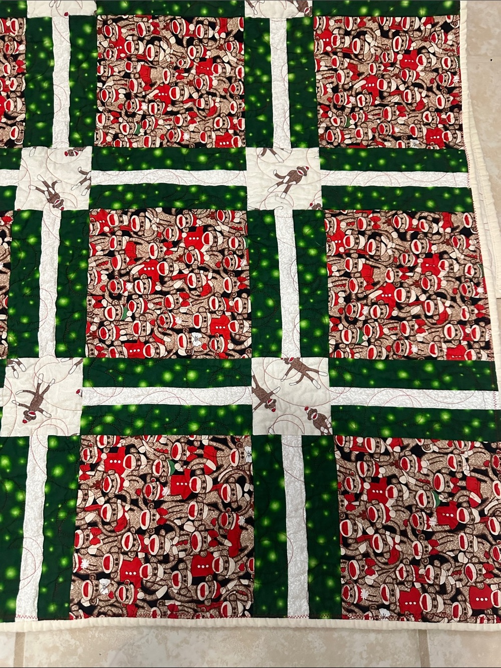 Sock monkey quilted throw